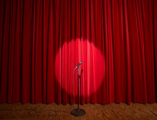 Microphone in spotlight on a stage