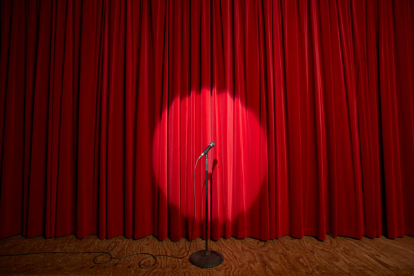 Microphone in spotlight on a stage